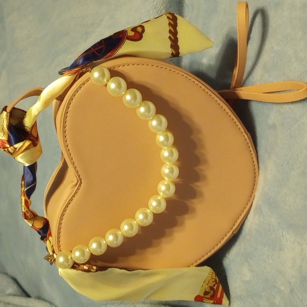 Pink leather Heart shaped bag